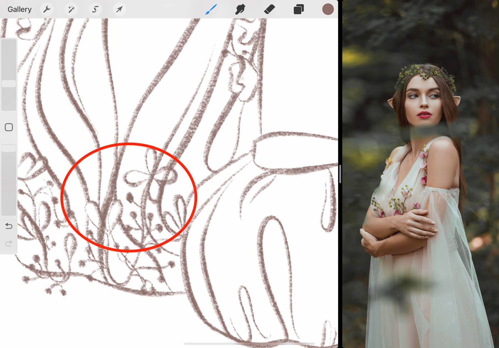 the area where the lines from the dress are overlapping the flowers is circled in red