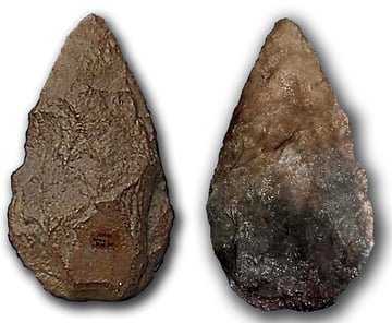 Lower paleolithic hand axes made from quartzite Image via Wikimedia