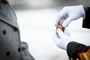 Full Frame of a ceremonial sprinkling of the ashes - Daniel Sone