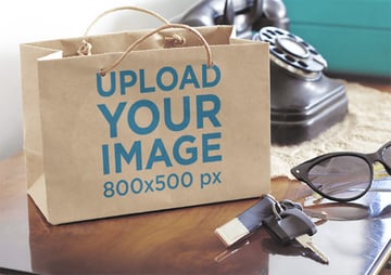 Paper Bag Mockup of a Shopping Bag Sitting on Top of a Table