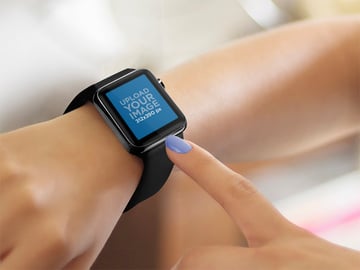 Close-up of Young Woman Using a Black Apple Watch on Her Wrist