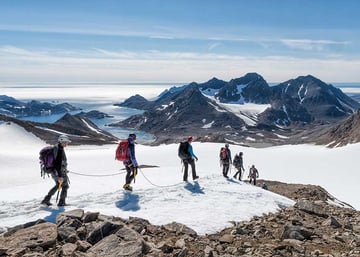 Group of people walking in snow