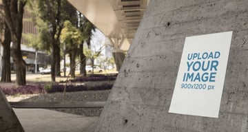 Poster on a Concrete Structure Below a Bridge in the City Mockup
