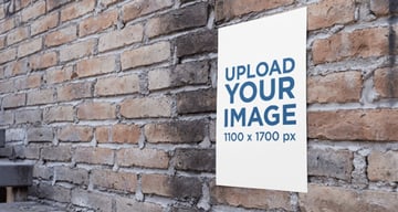 Poster on an Old Brick Wall Near a Stairway Mockup