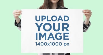 Mockup of a Woman Holding a Horizontal Poster at a Studio