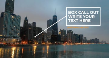 Image of a city at dawn with a transparent text box with white edge and white text. There's a line pointing to the opposite side of the screen. 