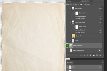option/alt click the eye on the paper texture layer to hide all other layers