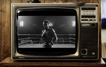 Widescreen image with letterboxing effect on TV