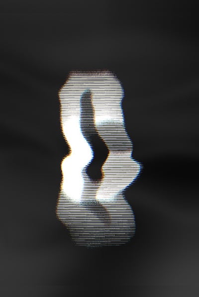 The Letter C in Different Fonts: Chromatic Glitch Text Effect
