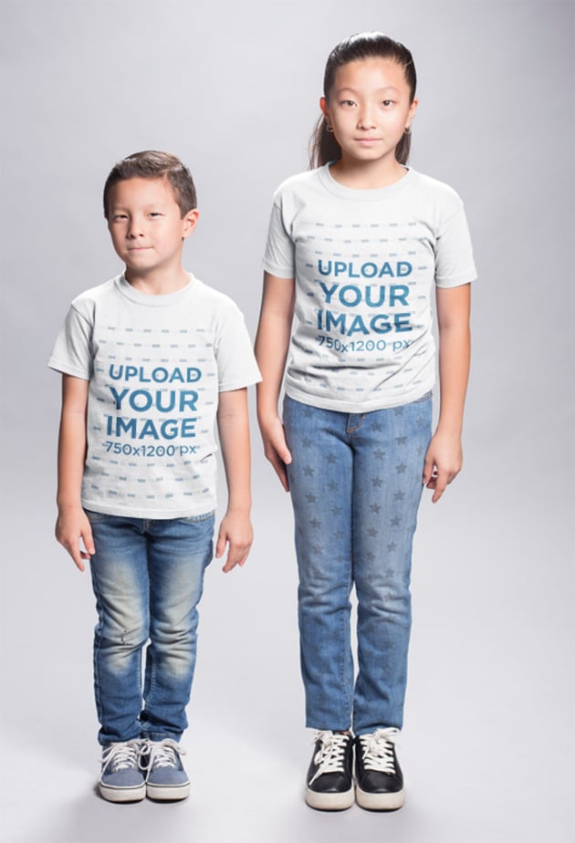 Asian Kids Wearing T-Shirts Mockup in a White Room
