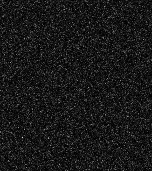 Go to Filter > Pixelate > Mezzotint, setting the Type to Coarse Dots.