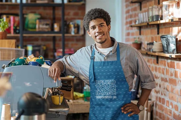 Young Barista Wearing Apron Mockup