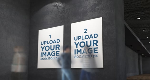 Mockup Featuring Two Exhibition Posters Hanging on a Dark Wall