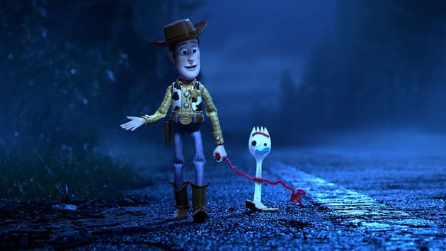 Woody and Forky walking down the road in Toy Story 4 (Image Credit: Pixar)