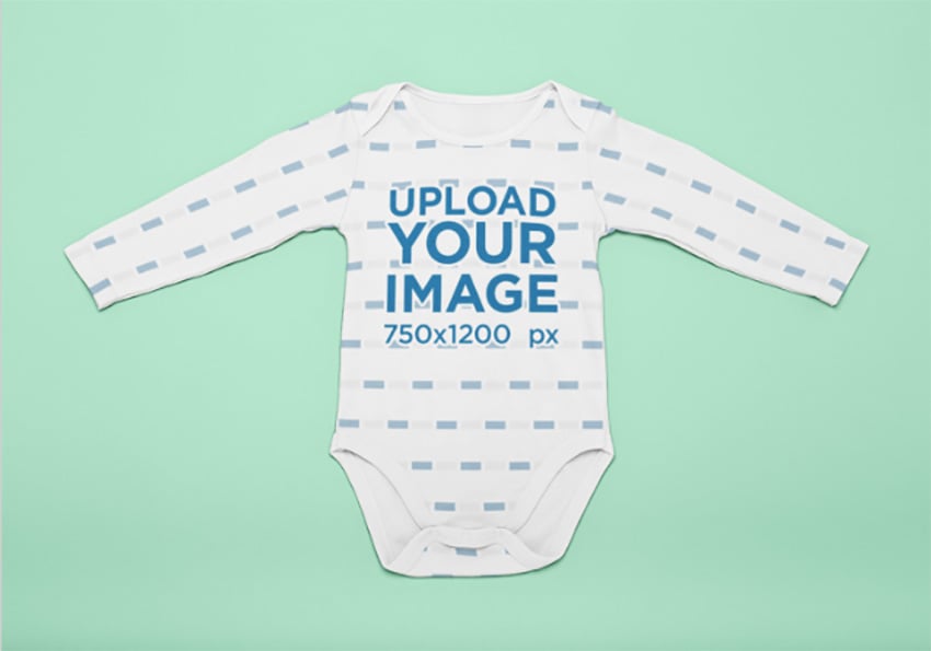 Mockup of a Onesie Laid Flat on a Surface