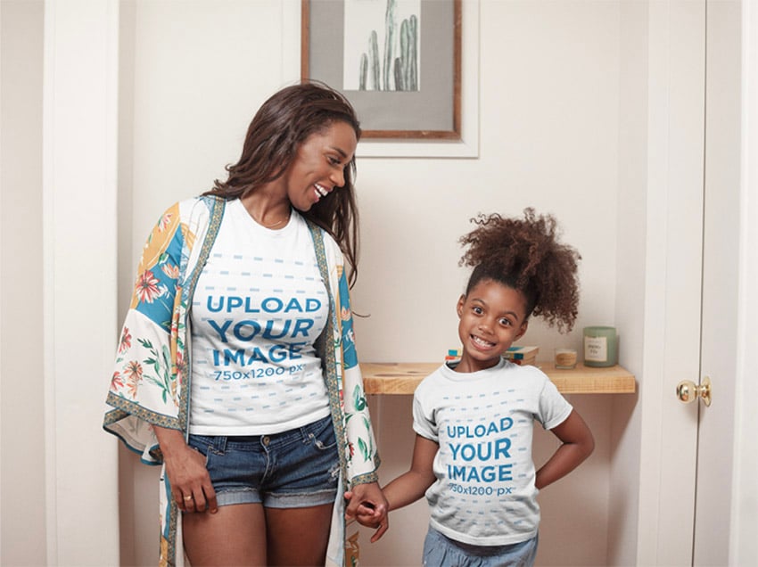 T-Shirt Mockup of a Happy Girl at Home with her Mom