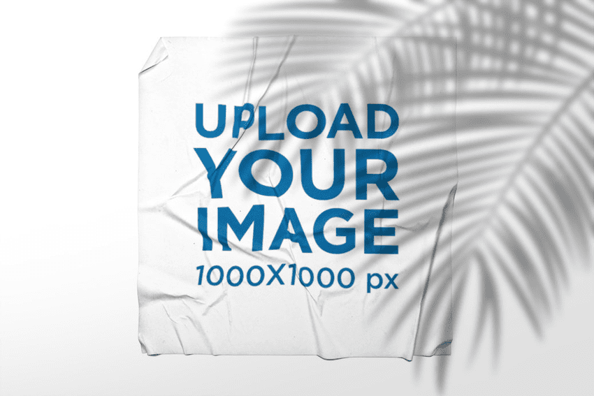 Mockup of a Squared Poster Glued to a Wall Under a Palm Tree Shade
