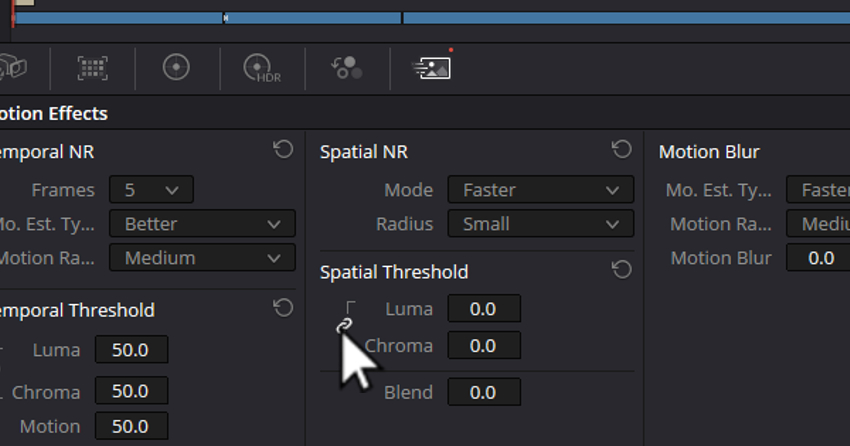 User clicking the link button under Spatial Threshold for understanding noise reduction in DaVinci Resolve.