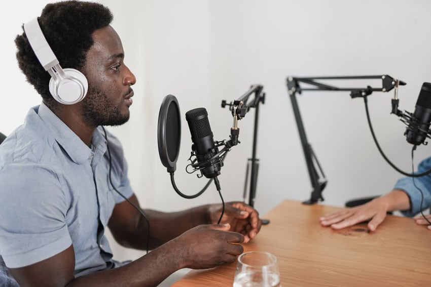 man talking into a microphone