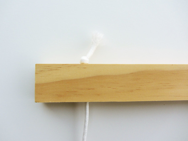 tie a knot at one end of each length of cord