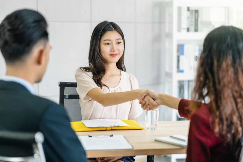 A good first impression can help you get hired in a job interview.