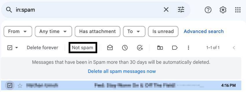 Click the not spam button to move a message out of the Spam folder