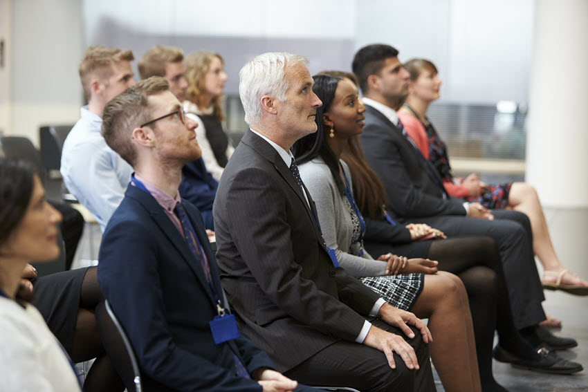 Audience at a persuasive presentation